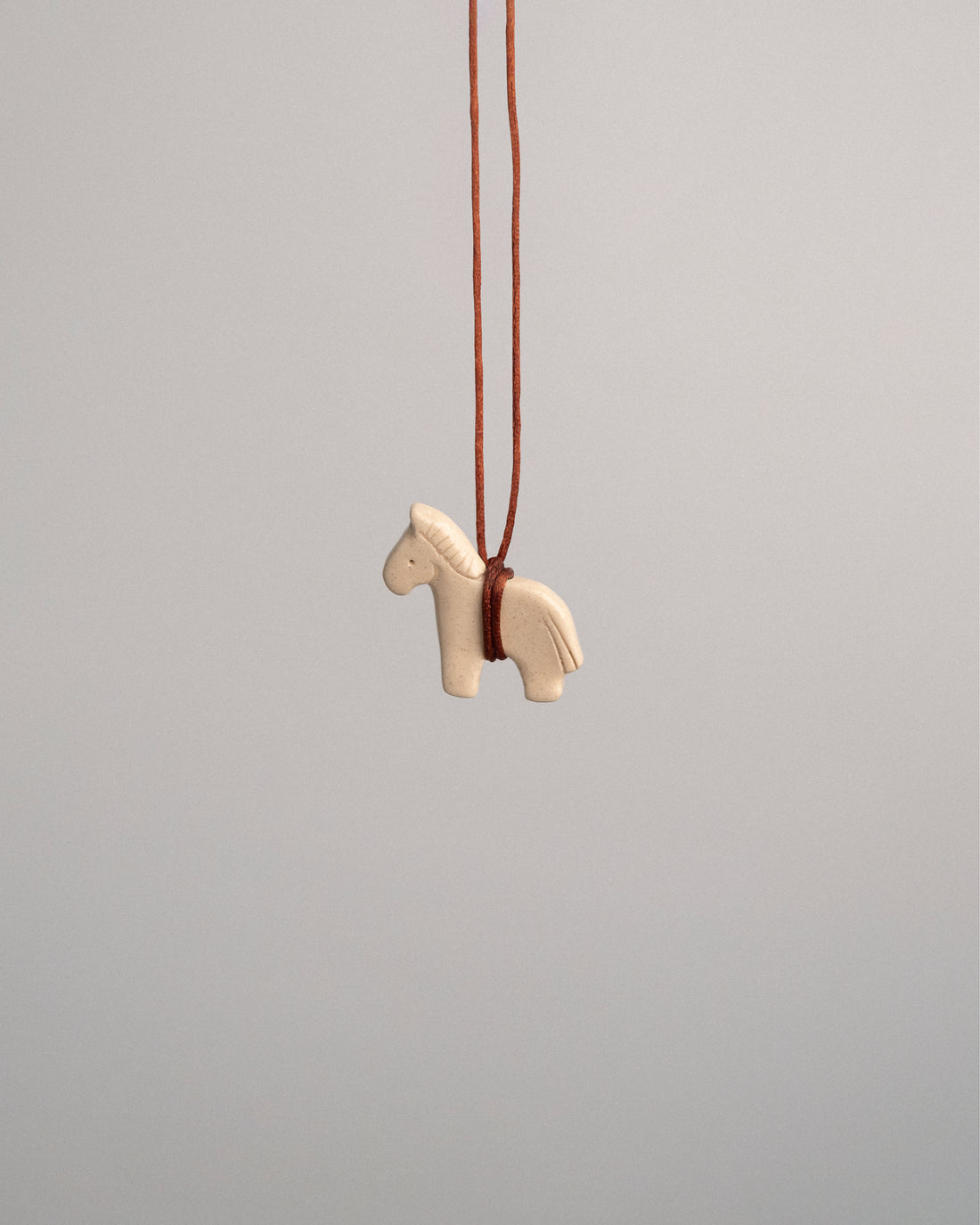 ceramic horse pendant